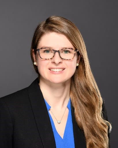 The image contains a picture of Emily Wright.